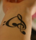 Chic Heart Treble Clef Tattoos for Men and Women