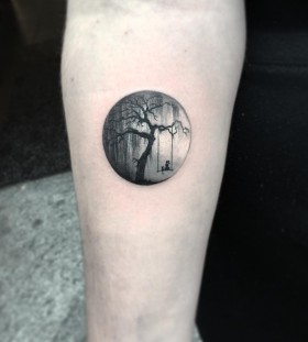 tree-and-swing-circle-tattoo