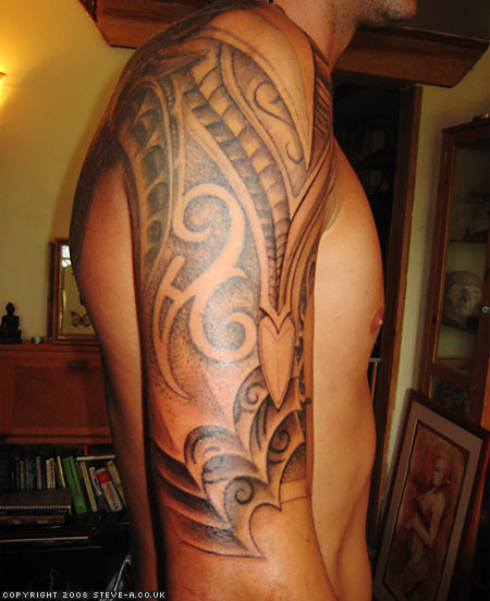 Amazing Shadows on Men’s Sleeve Tribal Tattoo