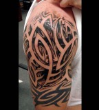 Upper Arm-Sleve Tribal Black and White Tattoo