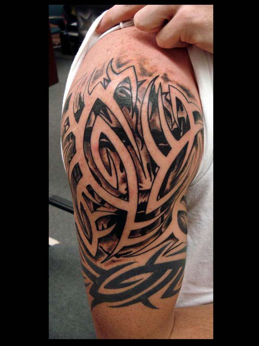Upper Arm-Sleve Tribal Black and White Tattoo