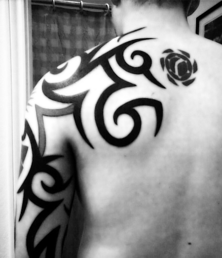 Black and White Tribal Tattoo Arm Sleeve Design
