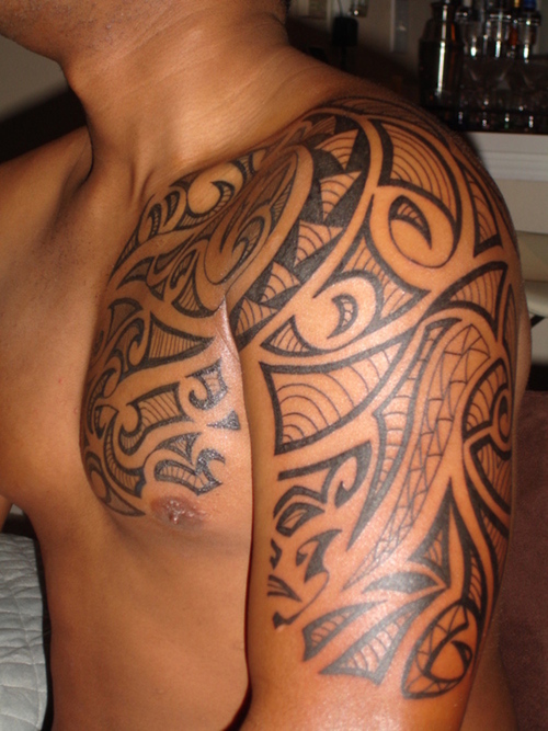 Half-Sleeve to Chest Tribal Tattoo Design for Men