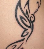 Swirly Inked Tribal Butterfly Tattoo