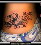 Fascinating Tribal Phoenix For Women Tattoo