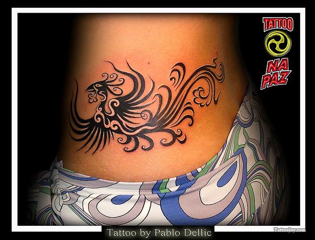 Fascinating Tribal Phoenix For Women Tattoo