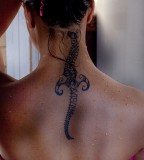 Tribal Tattoos Design at Upper Neck for Girl