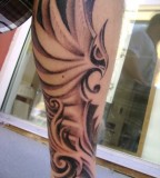 Cool Tribal Tattoo On Knee for Women 