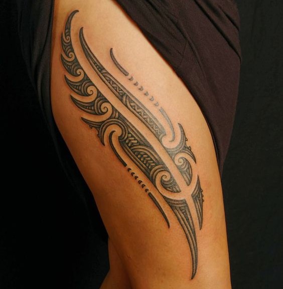 tribal thigh tattoo