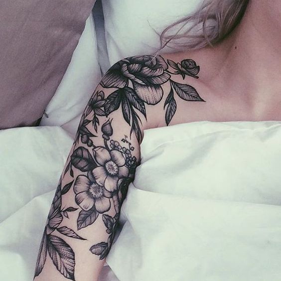 upper arm sleeve black and grey flower tattoo