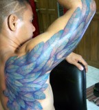 Blue Color Archangel Wing Tattoo Artists