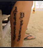 Exotic Aequitas Veritas Lower Leg Tattoo Design Idea for Men