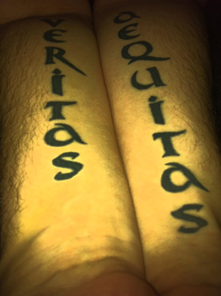 Long Lettering of Veritas Aequitas Tattoo on Leg