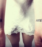 Stunning Veritas Aequitas Tattoo Design on Women Wrists