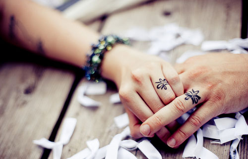 Cute Wedding Ring Tattoo on Finger