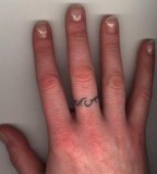 Unique Scripture Wedding Ring Themed Tattoo on Finger