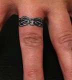 Gorgeous Wedding Ring Themed Tattoo Design on Finger