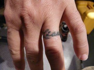 Charming Couple Name Wedding Ring Finger Tattoo