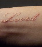 Love Tattoo Design On Forearm