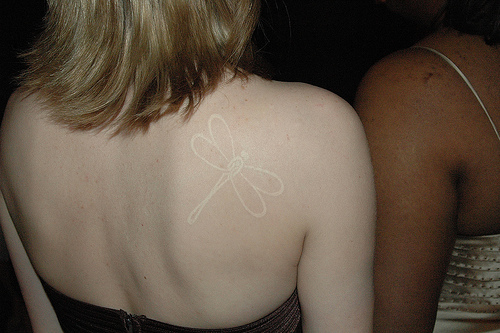 Dragonfly White Ink Tattoos On Upper Back