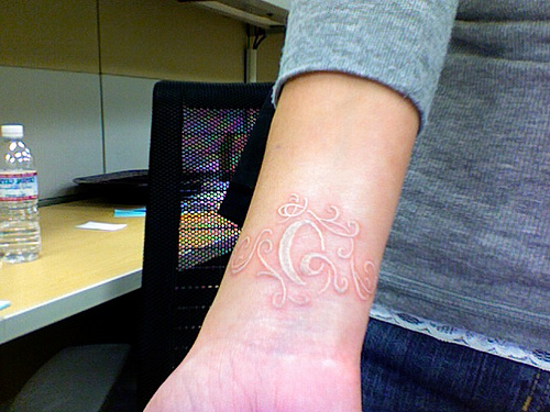 Swirl White Ink Tattoos On Hand For Girl