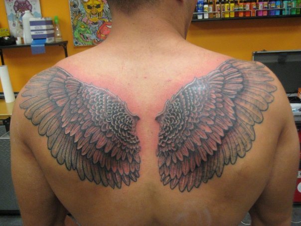 Upper-back Eagle’s Wings Tattoo Design for Men