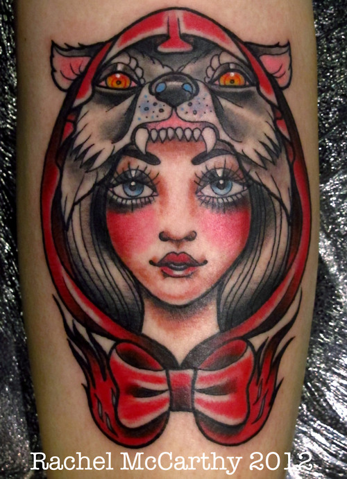Woman With Head of Wolf Tattoo