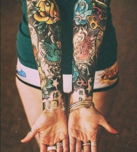 yellow and blue rose arm sleeves flower tattoo